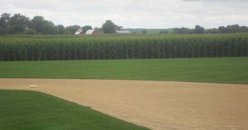Ghost players assemble in the infield at the original Lansing Farm site in  Dyersville, Iowa, where the nostalgic movie Field of Dreams was filmed in  1989